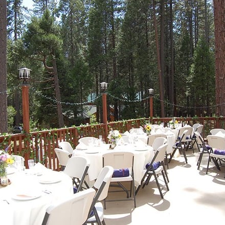 Wedding and Event Center outdoor deck setup with tables and chairs